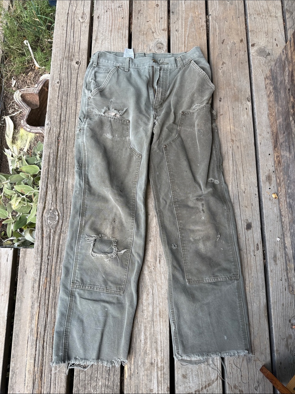 Distressed Carhartt pants